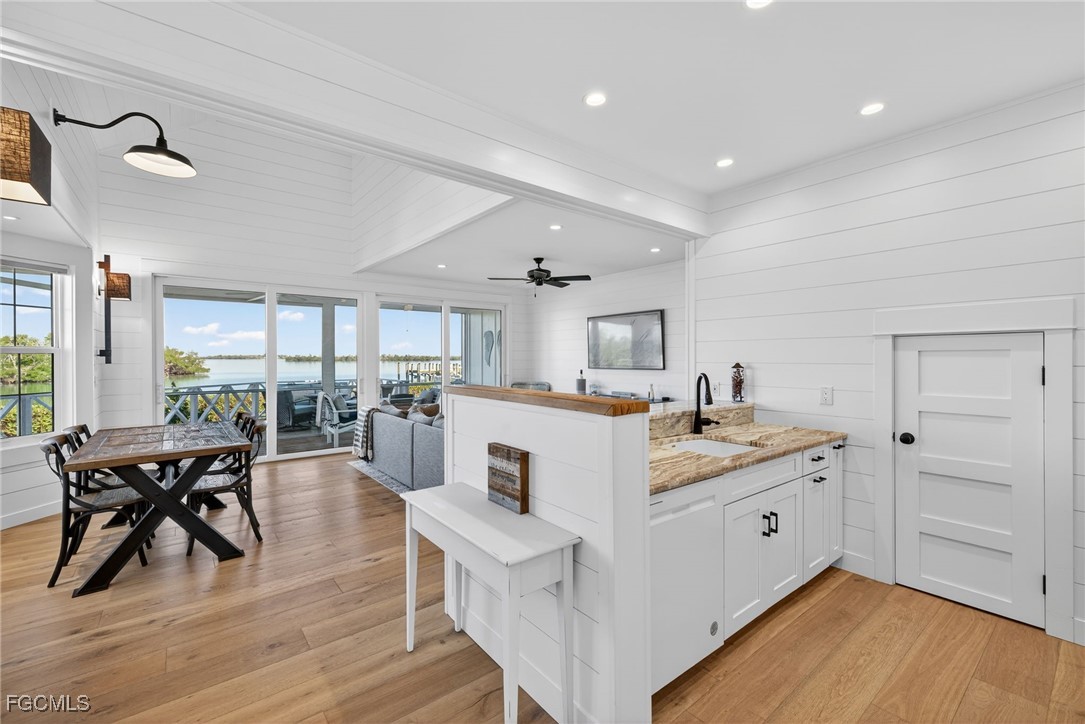 520 Useppa Island Bokeelia, FL 33922 - Photo 17 of 47 a view of a kitchen and dining room