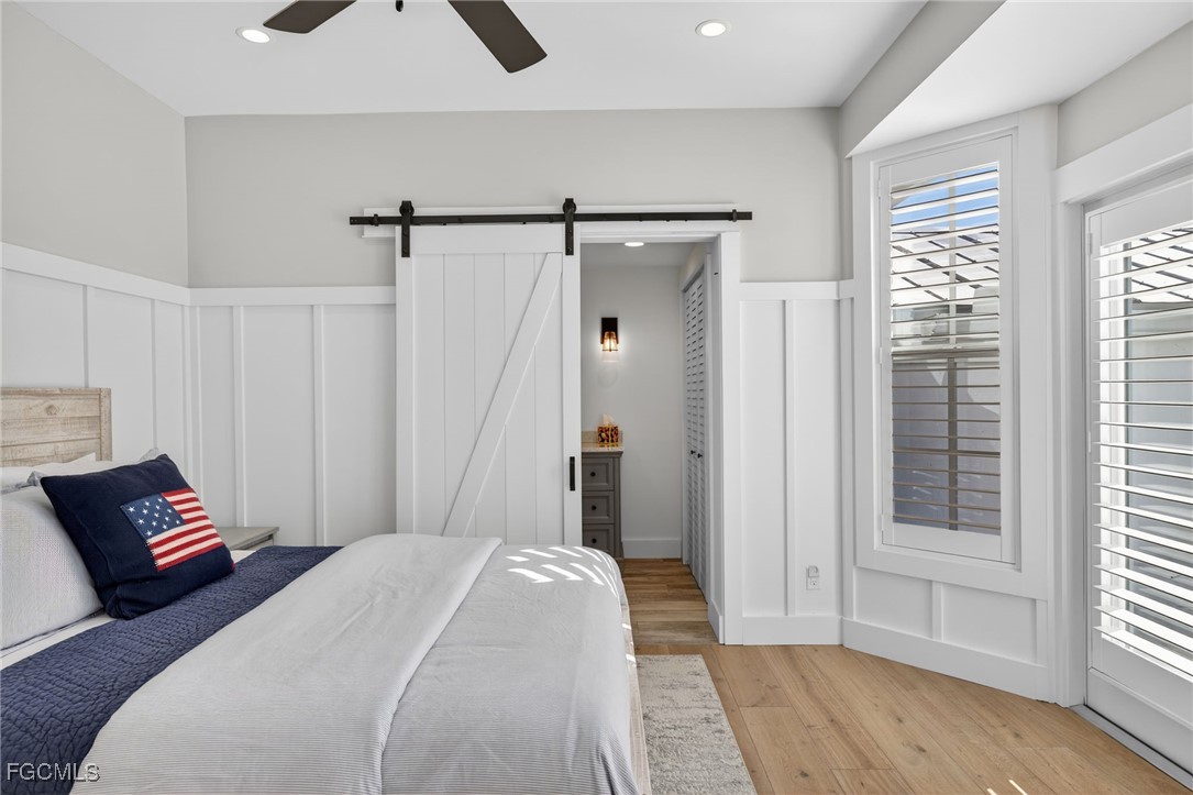 520 Useppa Island Bokeelia, FL 33922 - Photo 23 of 47 a bedroom with a bed and a window