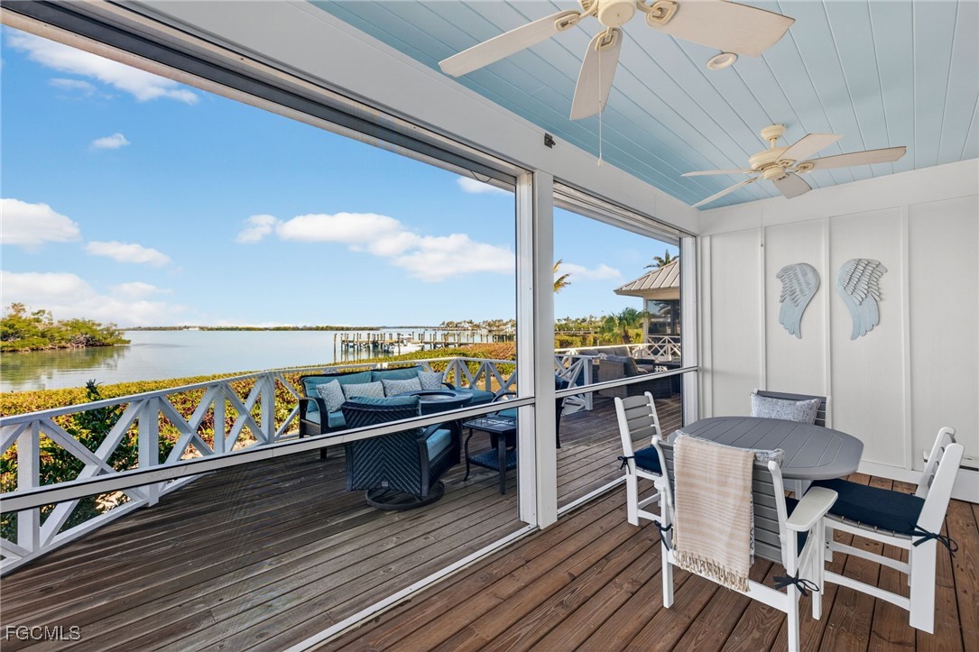 520 Useppa Island Bokeelia, FL 33922 - Photo 32 of 47 a view of a balcony with chairs