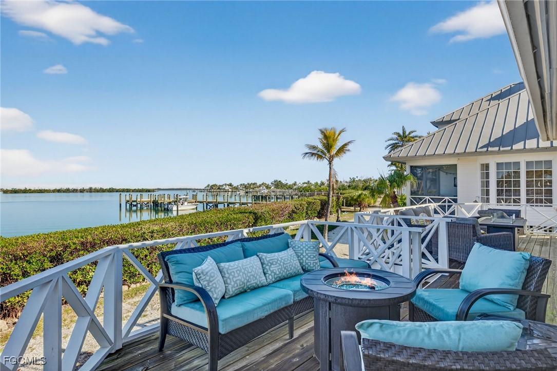 520 Useppa Island Bokeelia, FL 33922 - Photo 35 of 47 a view of roof deck with couches and potted plants