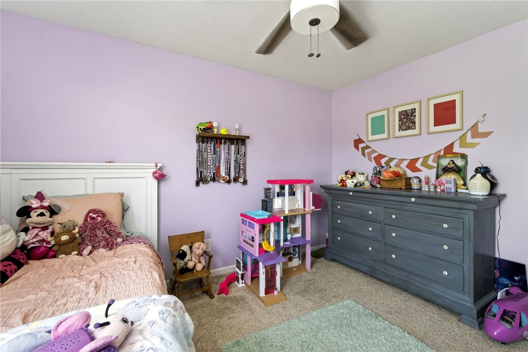 39 Holly Court Springboro, OH 45066 - Photo 24 of 42 This spacious bedroom offers comfortable living with ample natural light.