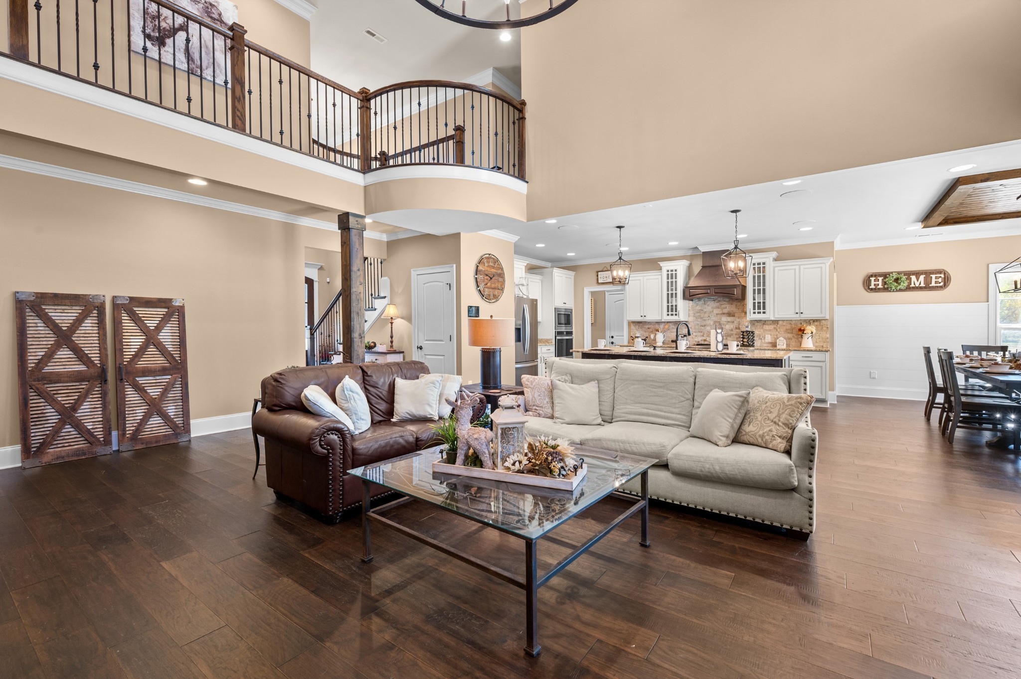 1591 North Lovvorn Road Christiana, TN 37037 - Photo 20 of 62 a living room with furniture a fireplace and a chandelier