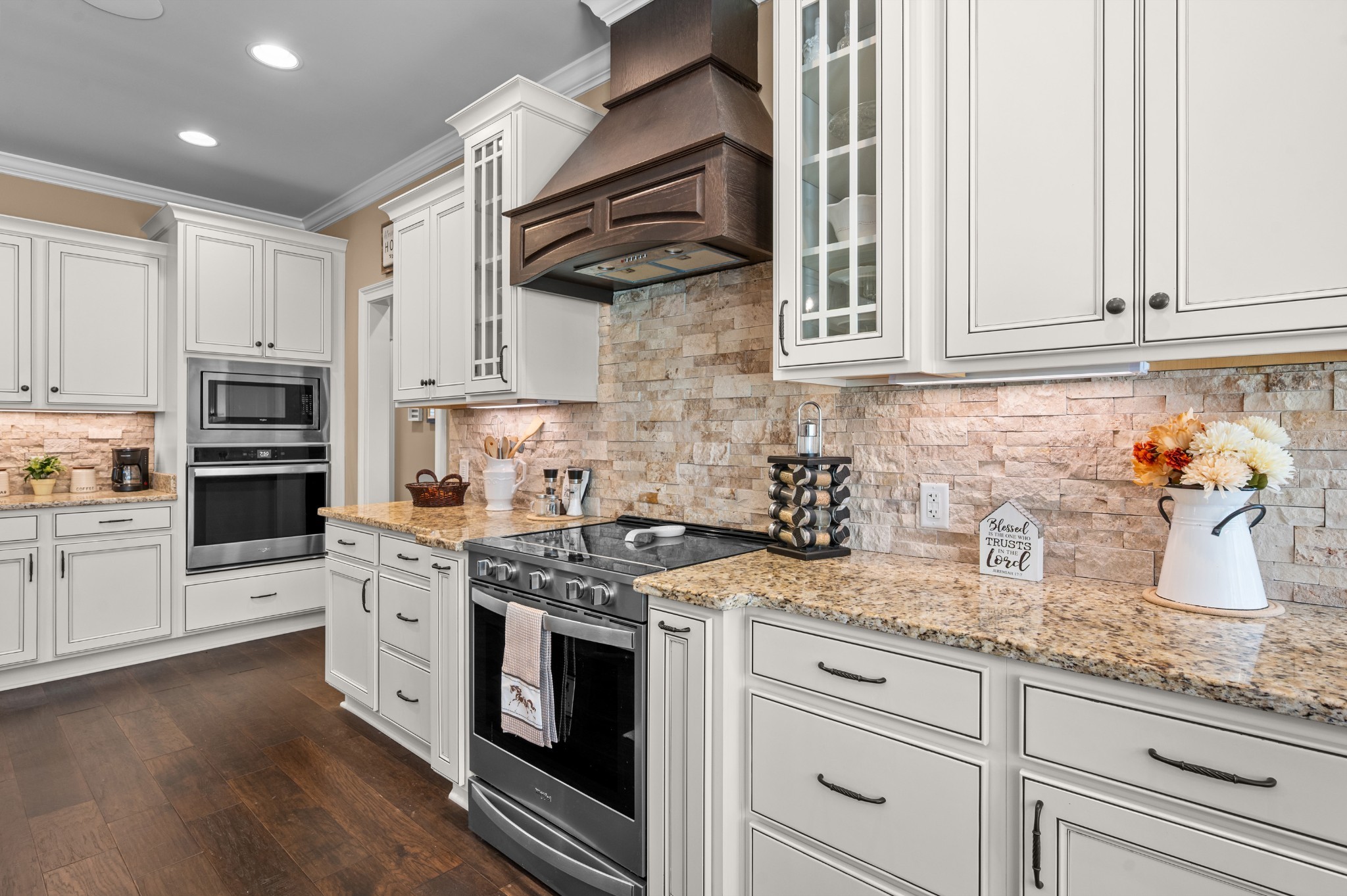 1591 North Lovvorn Road Christiana, TN 37037 - Photo 23 of 62 a kitchen with granite countertop stainless steel appliances white cabinets sink and stove
