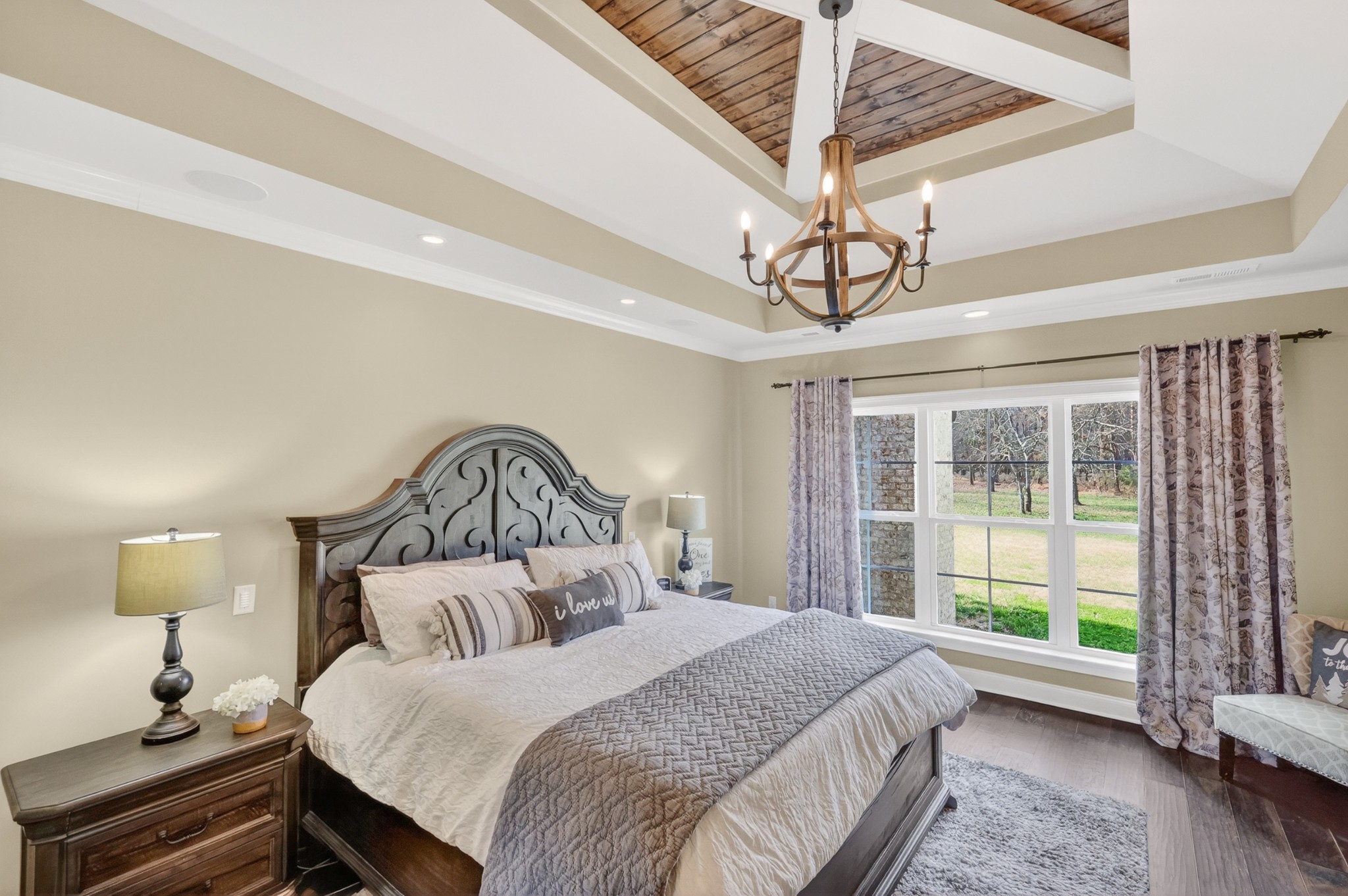 1591 North Lovvorn Road Christiana, TN 37037 - Photo 31 of 62 a bedroom with a bed and a chandelier