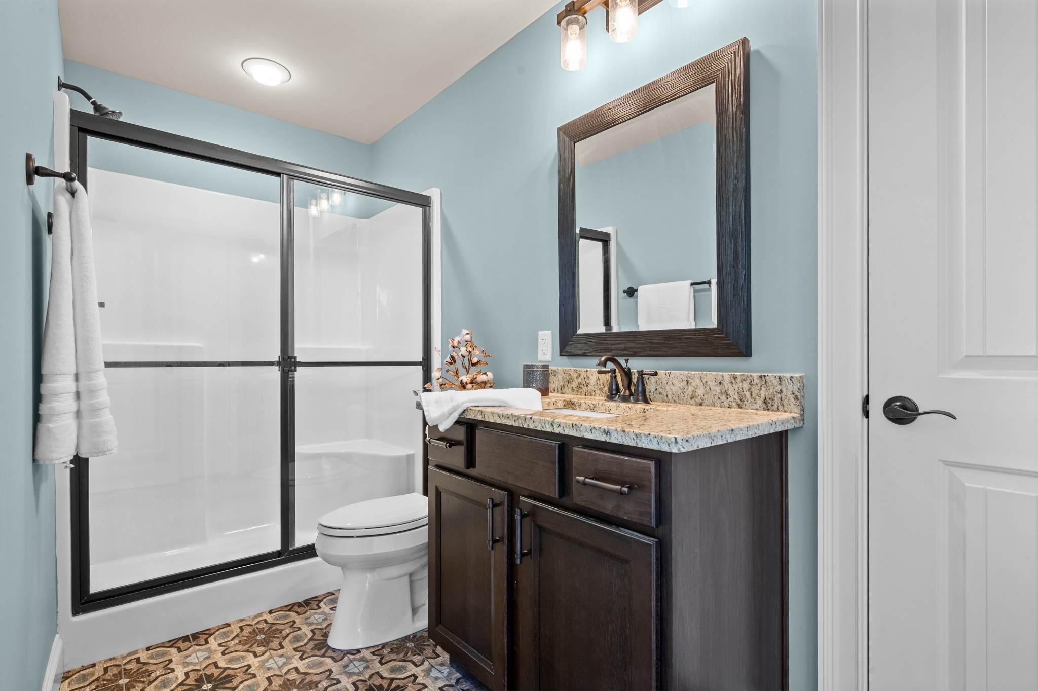 1591 North Lovvorn Road Christiana, TN 37037 - Photo 41 of 62 a bathroom with a granite countertop sink toilet and mirror