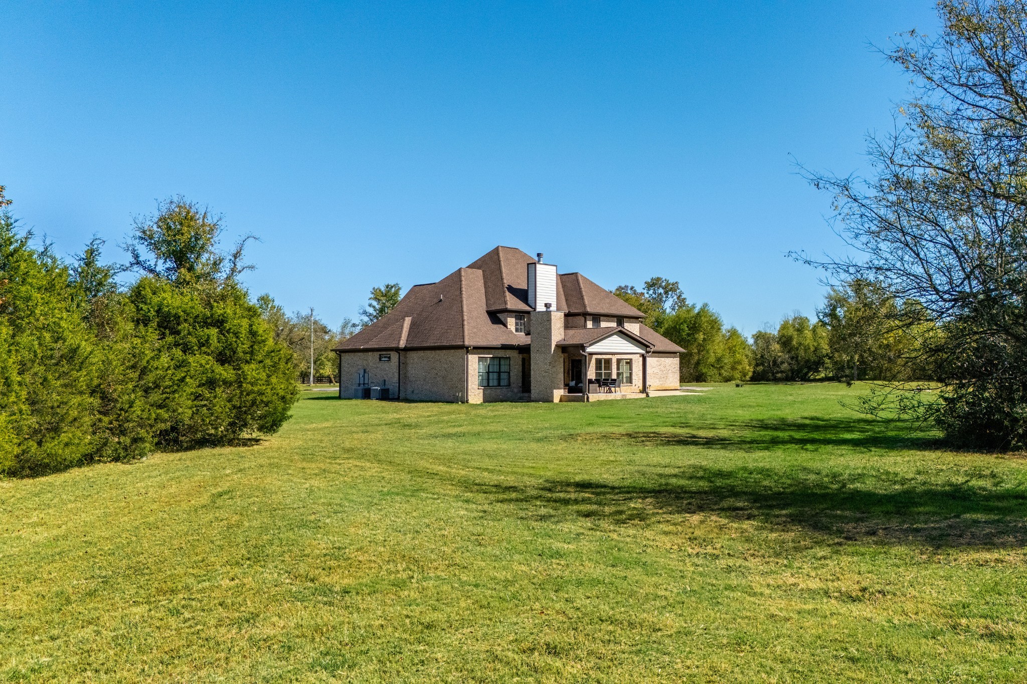 1591 North Lovvorn Road Christiana, TN 37037 - Photo 52 of 62 a house with green field in front of it