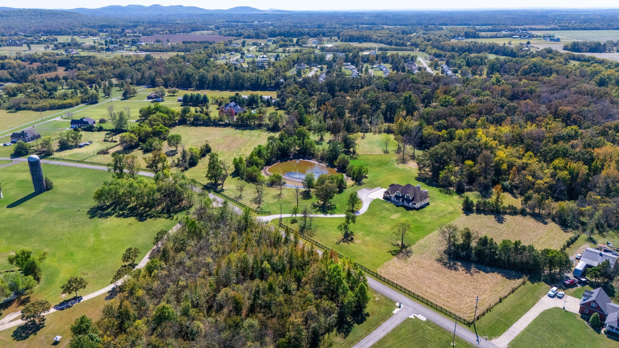 1591 North Lovvorn Road Christiana, TN 37037 - Photo 56 of 62 an aerial view of green landscape with trees houses and mountain view