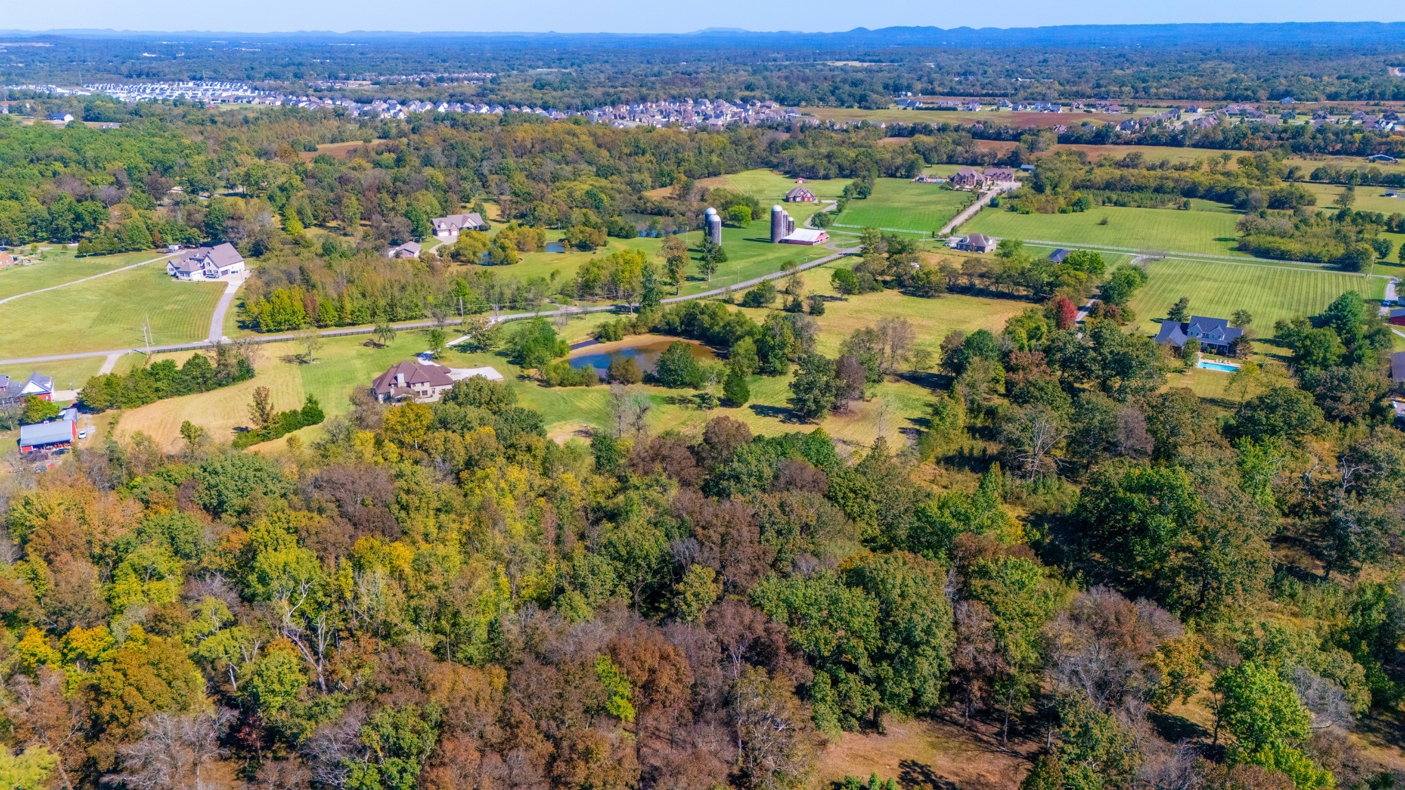1591 North Lovvorn Road Christiana, TN 37037 - Photo 58 of 62 an aerial view of residential houses with outdoor space and trees