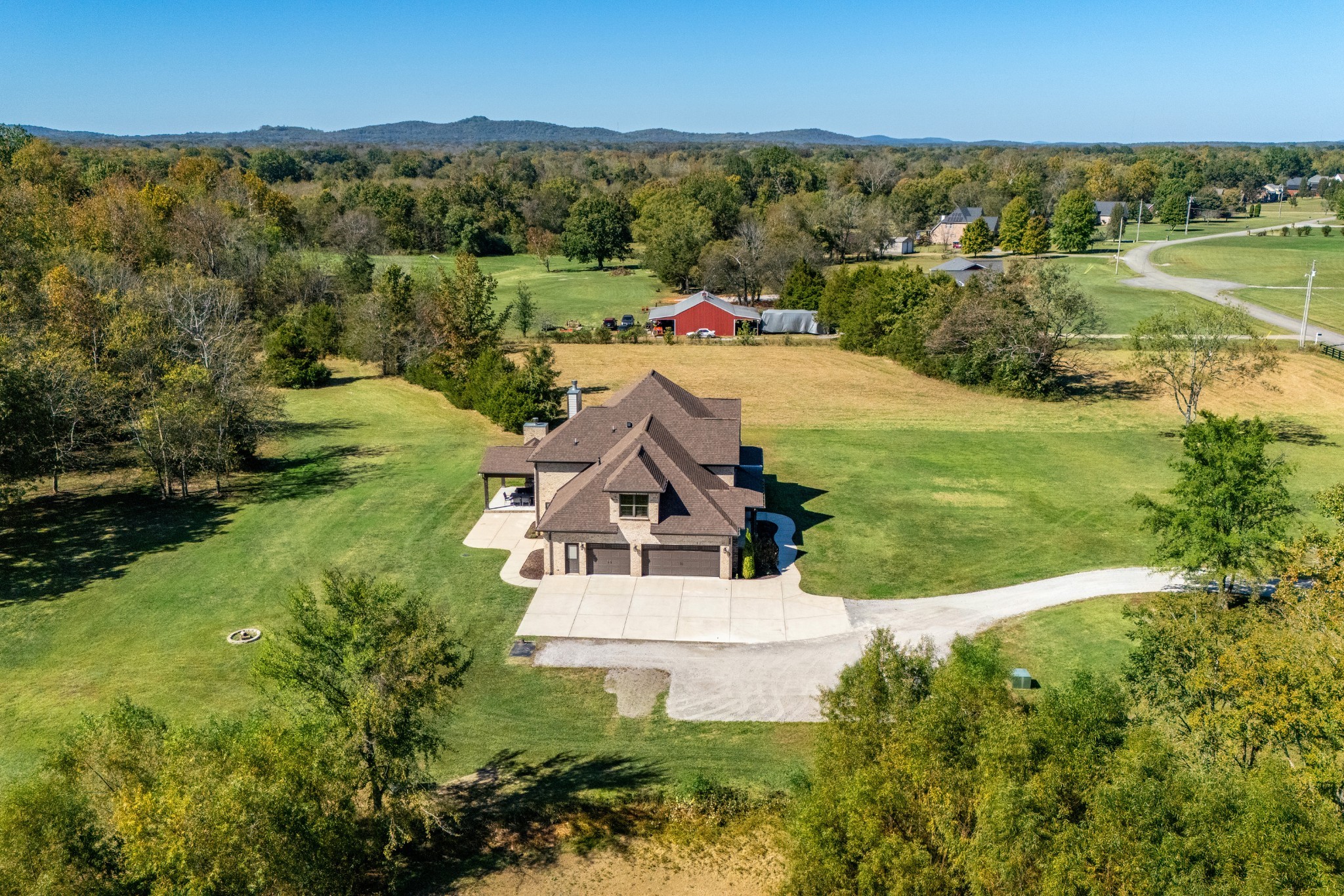 1591 North Lovvorn Road Christiana, TN 37037 - Photo 7 of 62 an aerial view of a house with a yard and lake view