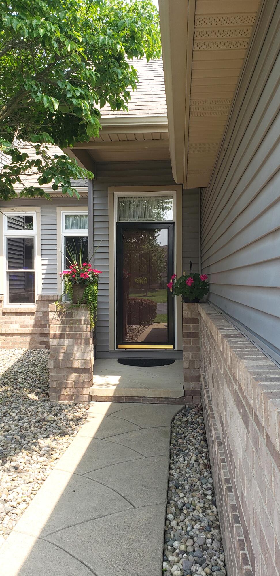 621 Ridge Lane Tecumseh, MI 49286 - Photo 3 of 28 #3 front walkway