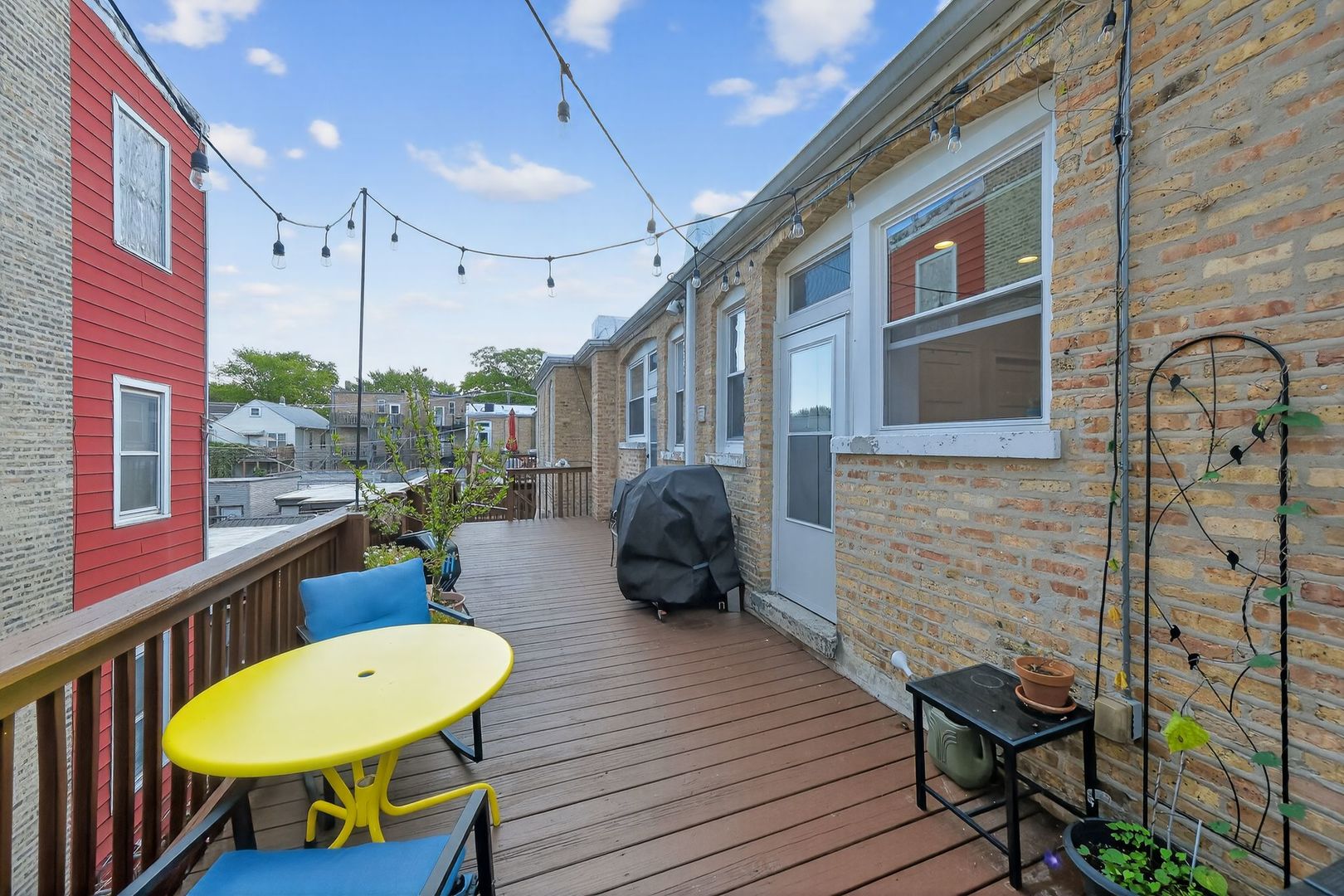 2578 West Lyndale Street, Unit 2 Chicago, IL 60647 - Photo 14 of 17 a view of a porch with furniture and a yard