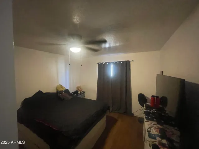 a room with furniture and a flat screen tv