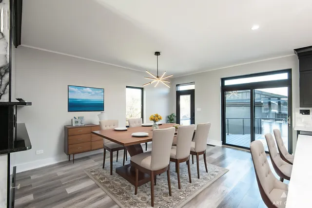 a bedroom with a large bed and a ceiling fan