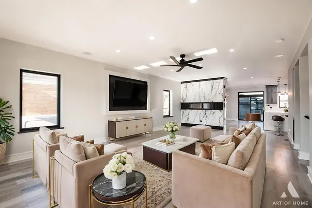 a bedroom with a bed couch and window