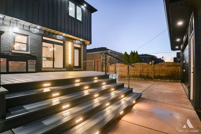 a kitchen with a sink stainless steel appliances and cabinets