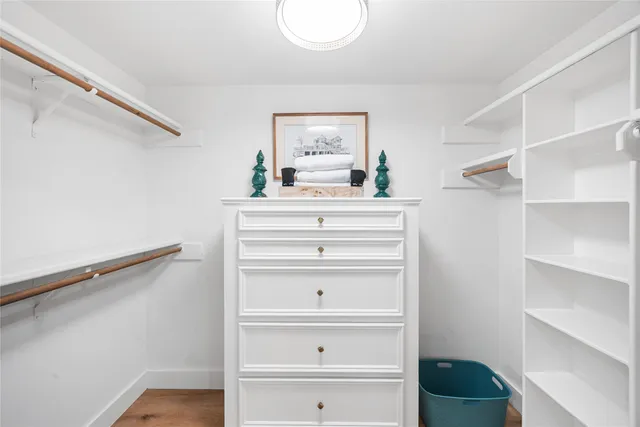 a bathroom with a bathtub and window