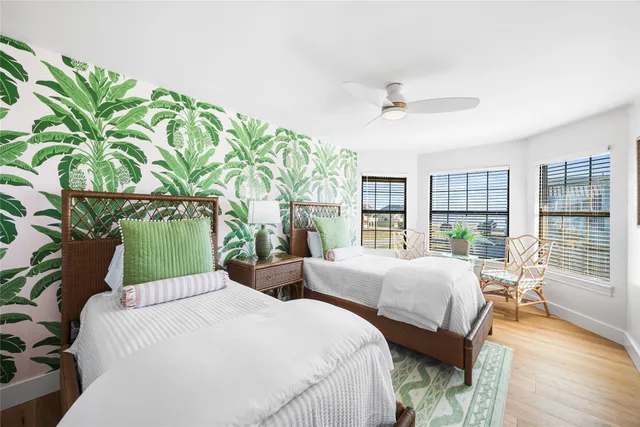 a bathroom with a sink a mirror and a shower