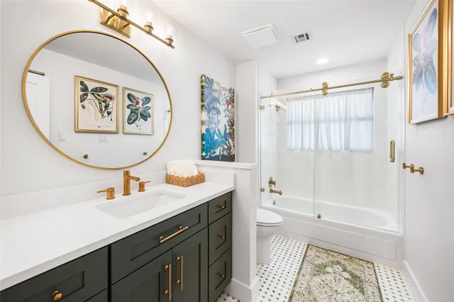 a bedroom with a bed and a cabinets