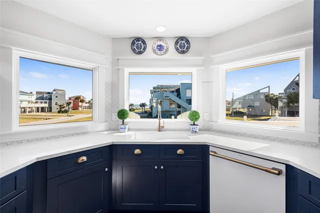 a bathroom with a sink and a large mirror