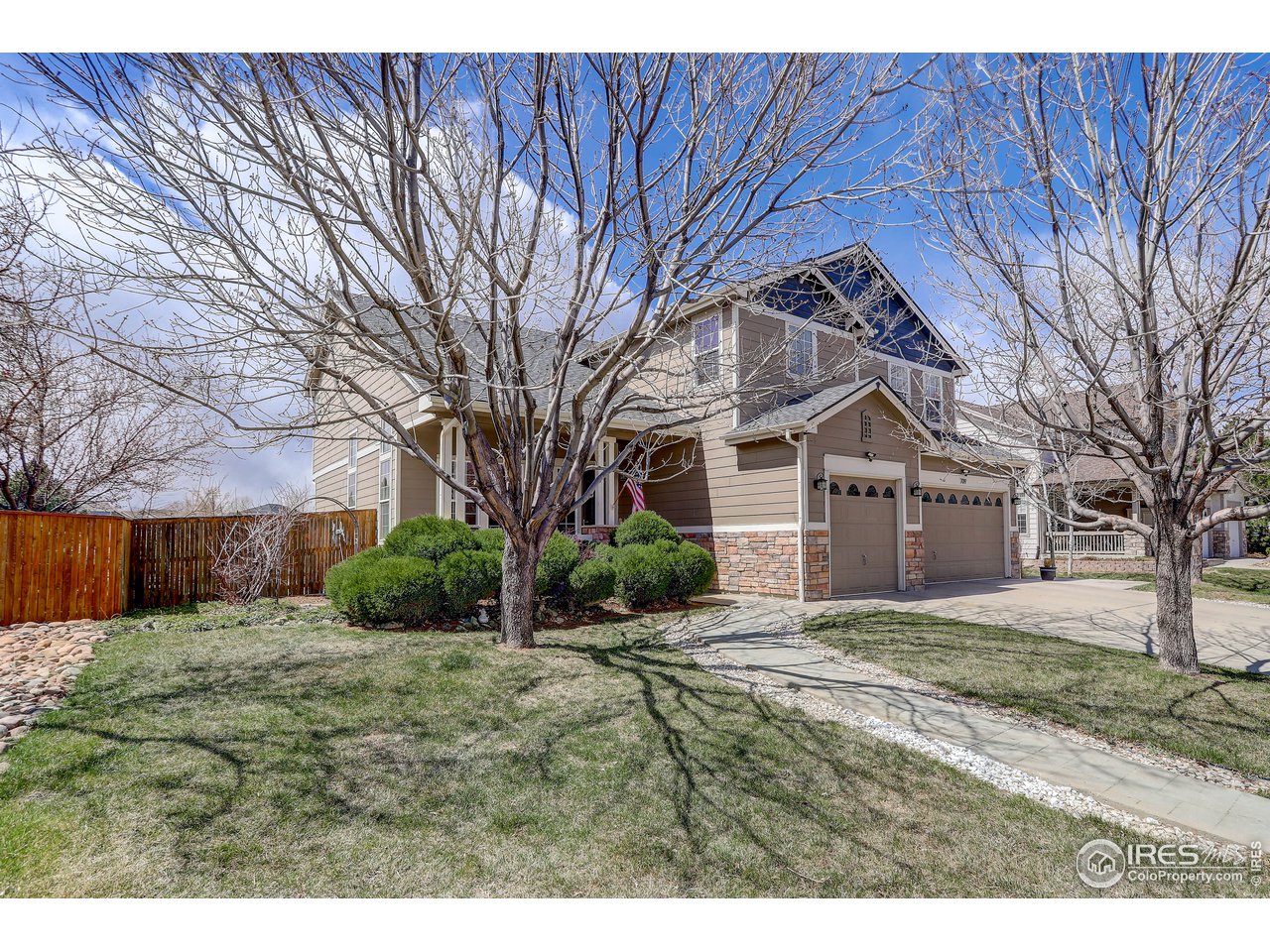 709 Glenarbor Circle Longmont, CO 80504 - Photo 2 of 40 a view of a front of house with a tree