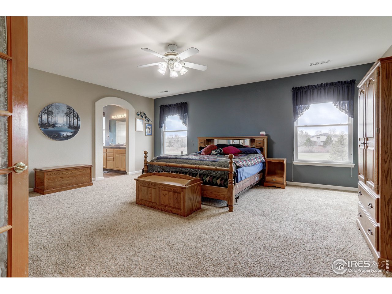 709 Glenarbor Circle Longmont, CO 80504 - Photo 23 of 40 a living room with furniture and a large window