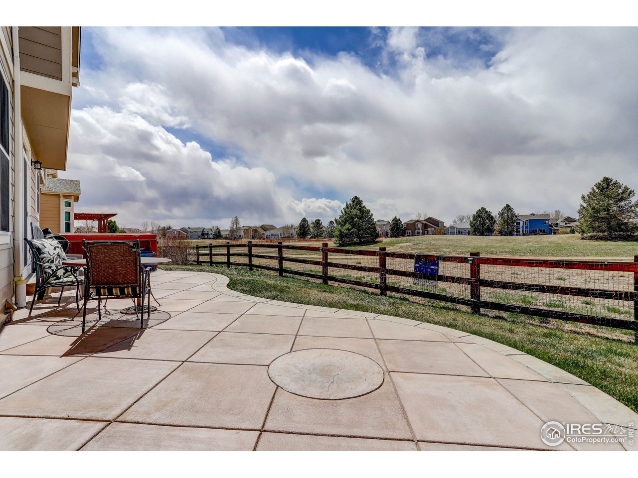 709 Glenarbor Circle Longmont, CO 80504 - Photo 3 of 40 a terrace with outdoor seating and city view