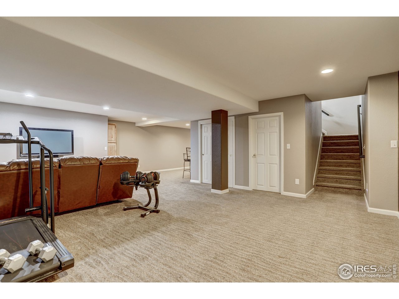 709 Glenarbor Circle Longmont, CO 80504 - Photo 34 of 40 a view of a room with gym equipment