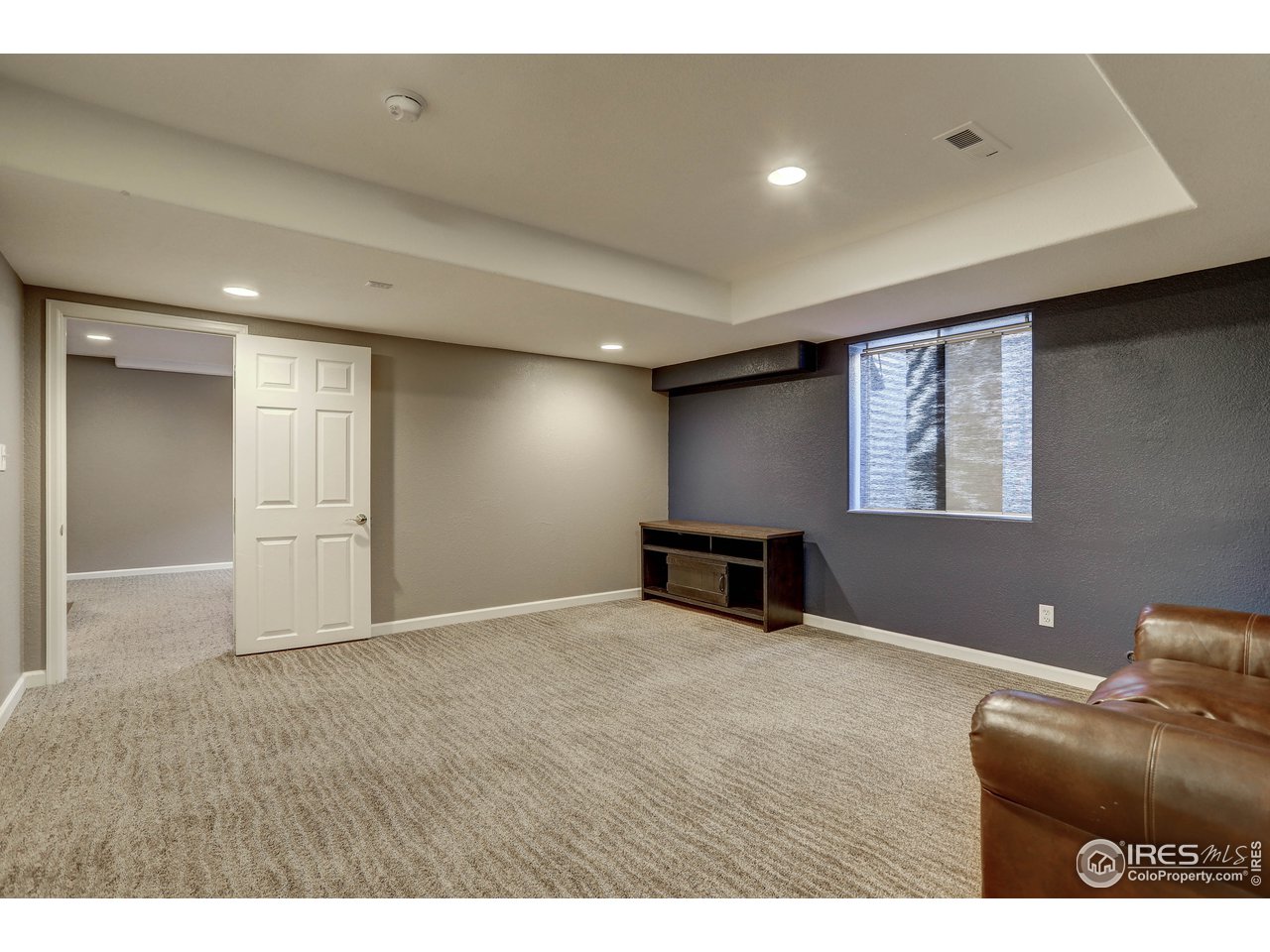 709 Glenarbor Circle Longmont, CO 80504 - Photo 35 of 40 a view of an empty room with a window