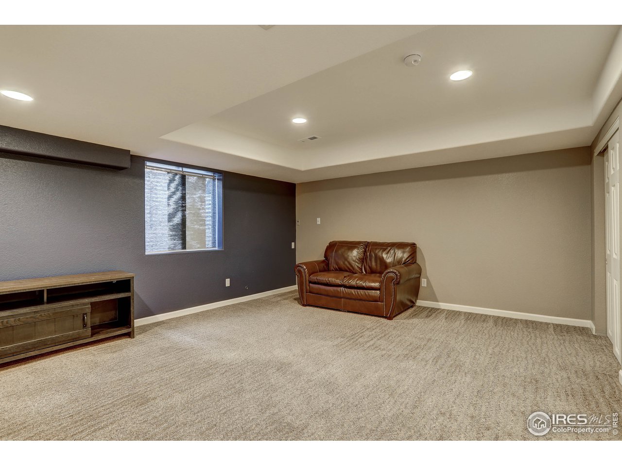 709 Glenarbor Circle Longmont, CO 80504 - Photo 36 of 40 a living room with furniture