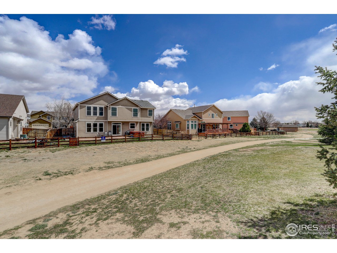 709 Glenarbor Circle Longmont, CO 80504 - Photo 37 of 40 a view of multiple houses with a yard