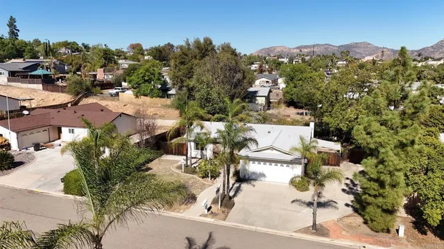 an aerial view of a house with a garden