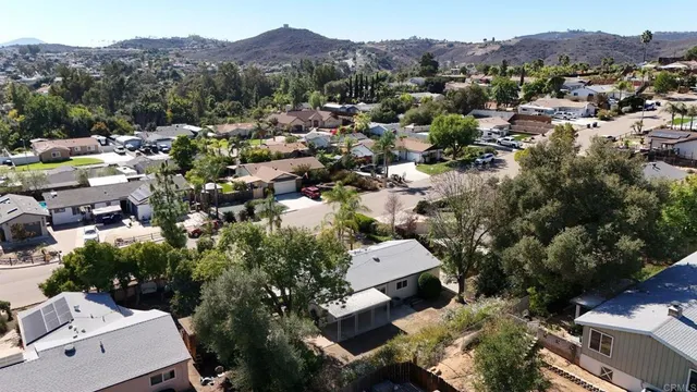 an aerial view of a house with a outdoor space