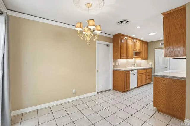 a view of a kitchen with a sink