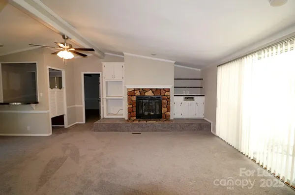a view of a livingroom with a fireplace