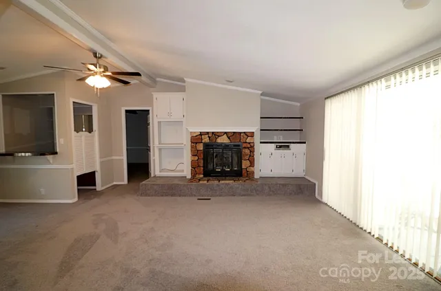 a view of a livingroom with a fireplace