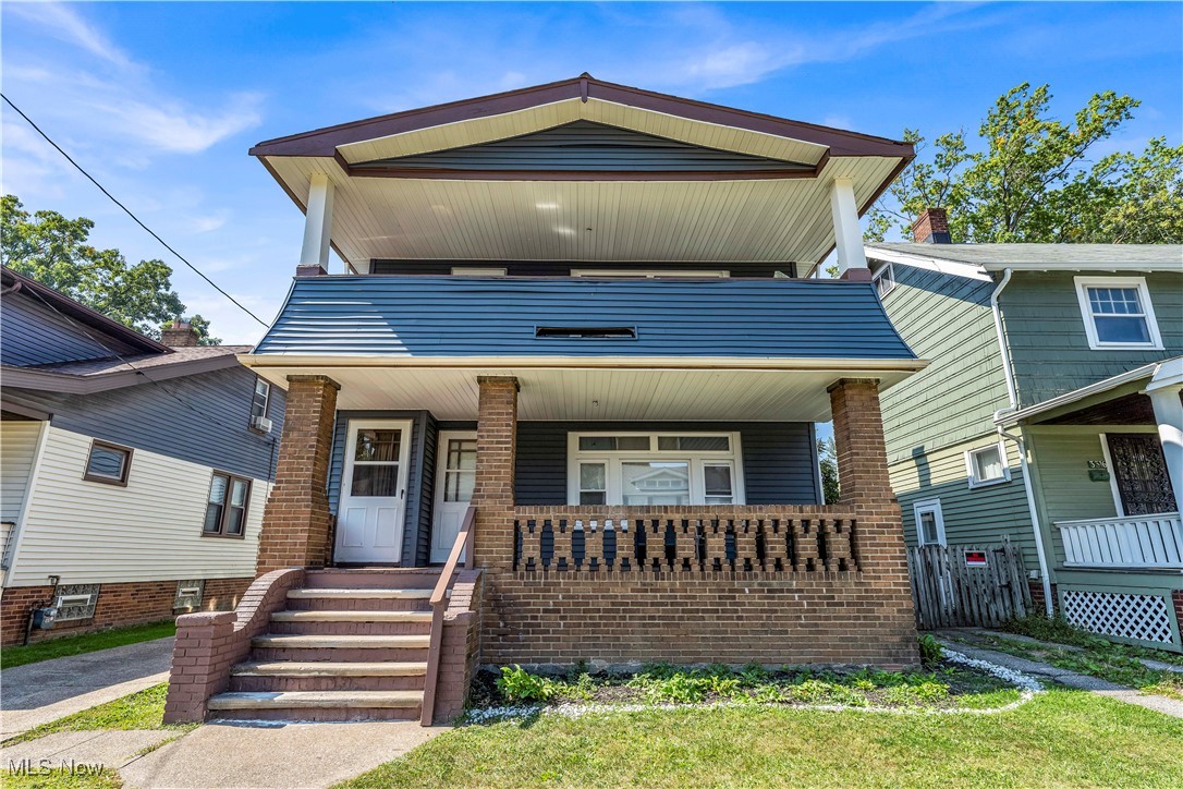 3320 Berea Road Cleveland, OH 44111 - Photo 2 of 26 View of front of home featuring covered porch and brick siding