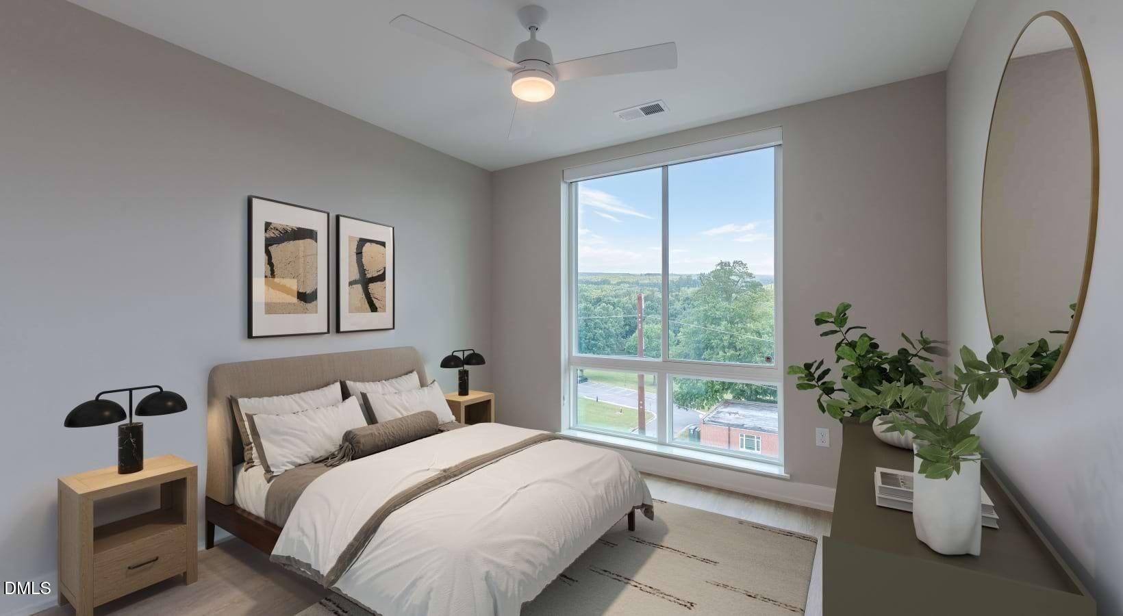 1000 Hammell Drive, Unit S3 Raleigh, NC 27603 - Photo 28 of 35 a bedroom with bed and a potted plant