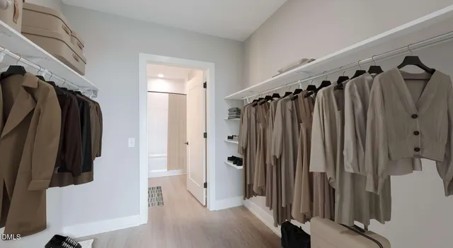 a kitchen with a refrigerator and a sink