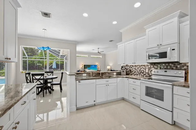 $925,000 | 4821 Southwest Lake Grove Circle, Palm City, FL 34990