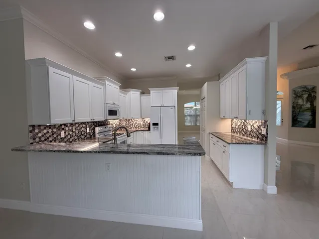 $925,000 | 4821 Southwest Lake Grove Circle, Palm City, FL 34990