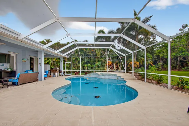 $925,000 | 4821 Southwest Lake Grove Circle, Palm City, FL 34990