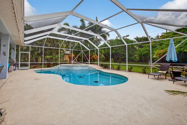 $925,000 | 4821 Southwest Lake Grove Circle, Palm City, FL 34990