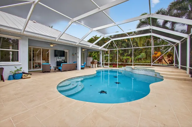 $925,000 | 4821 Southwest Lake Grove Circle, Palm City, FL 34990