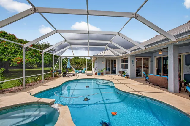 $925,000 | 4821 Southwest Lake Grove Circle, Palm City, FL 34990