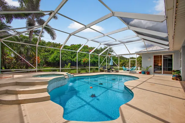 $925,000 | 4821 Southwest Lake Grove Circle, Palm City, FL 34990