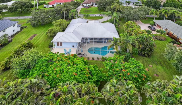 $925,000 | 4821 Southwest Lake Grove Circle, Palm City, FL 34990