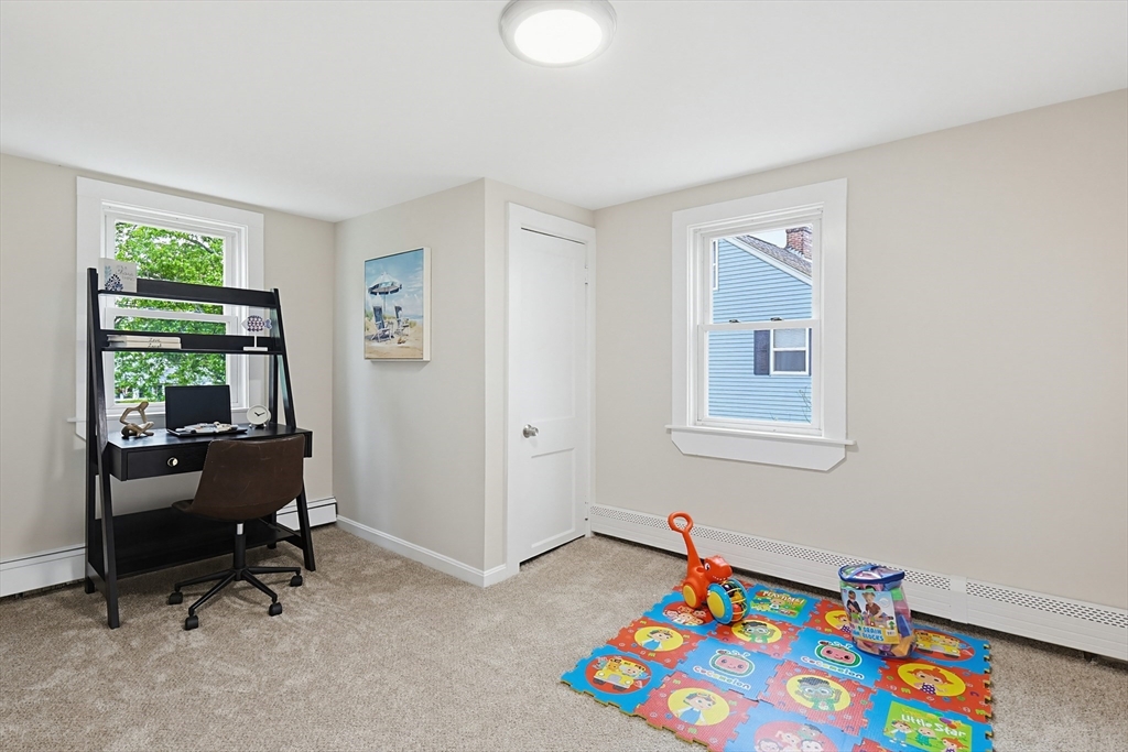 24 Otis Road Barnstable, MA 02601 - Photo 30 of 33 a view of a bedroom with baby toys and a window
