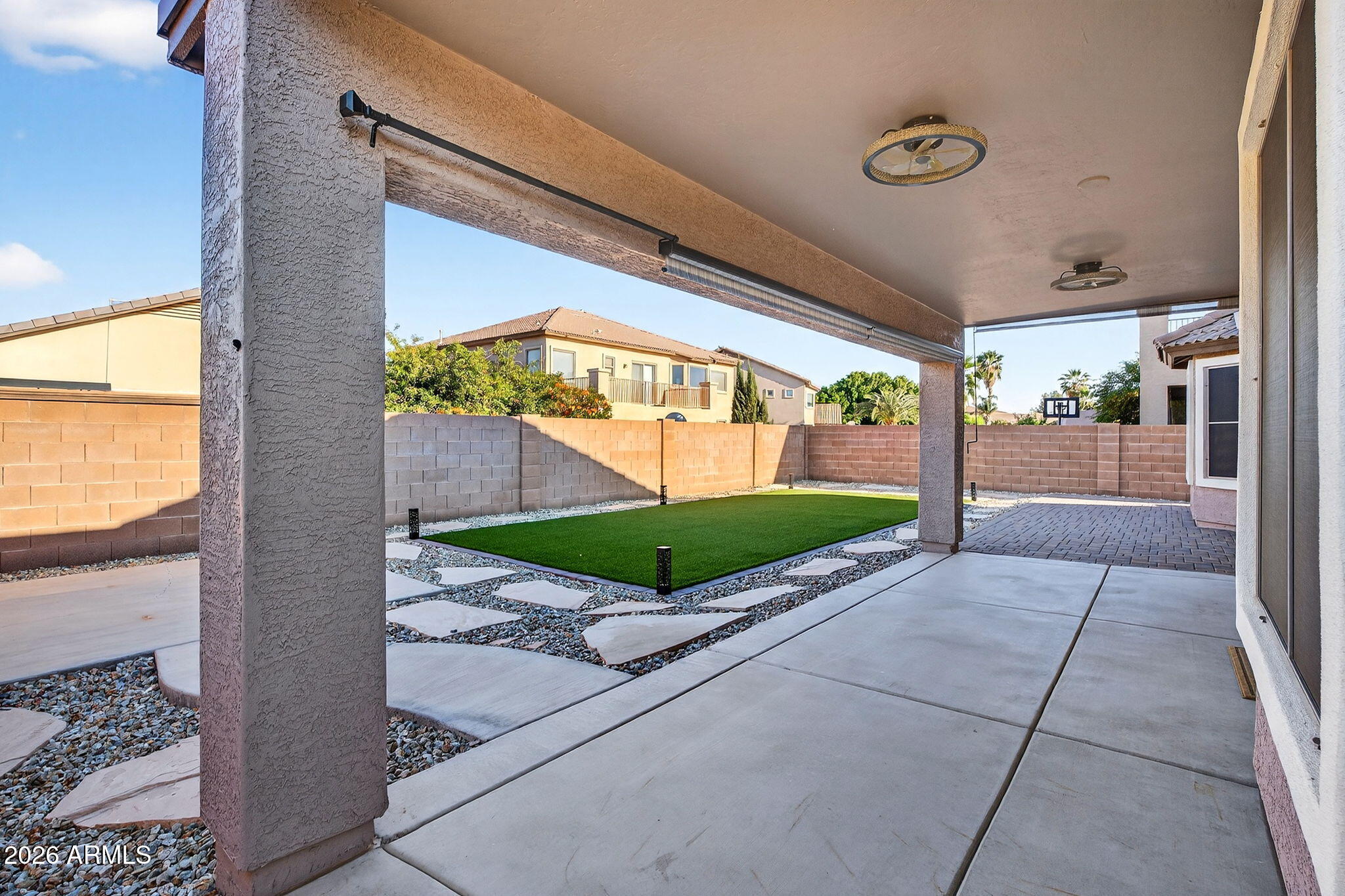1815 South 174th Avenue Goodyear, AZ 85338 - Photo 18 of 57 a view of backyard with a garden and plants
