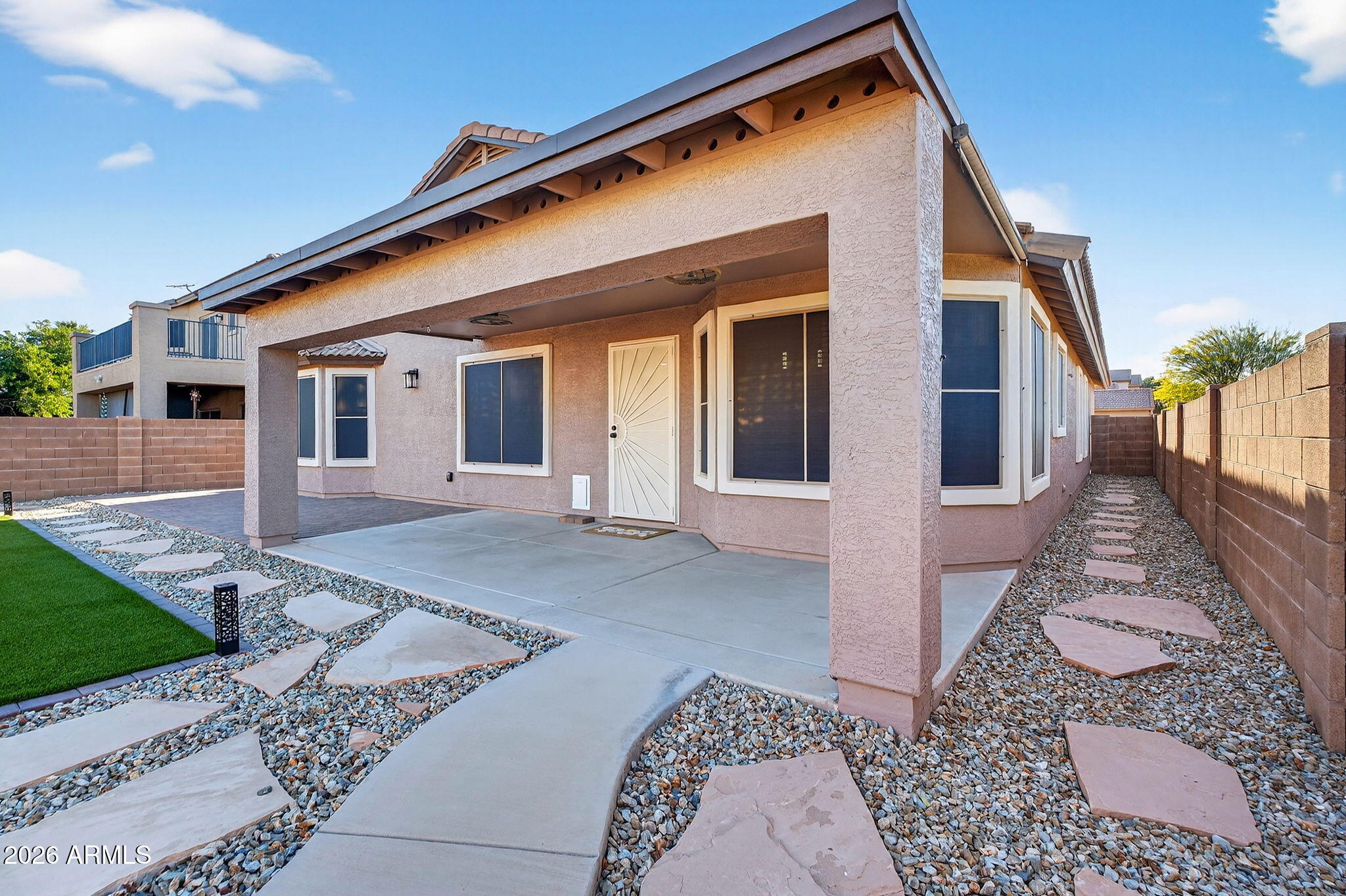 1815 South 174th Avenue Goodyear, AZ 85338 - Photo 24 of 57 a view of a house with a yard