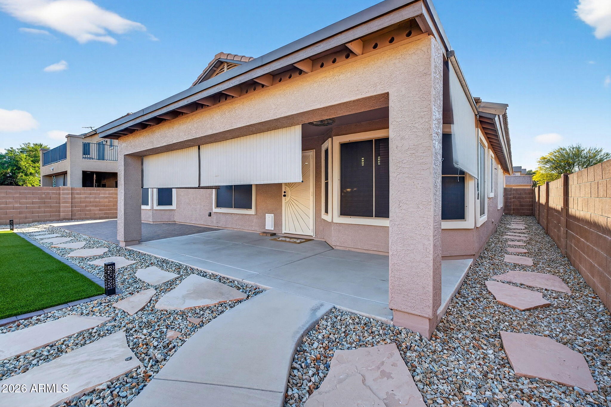 1815 South 174th Avenue Goodyear, AZ 85338 - Photo 25 of 57 a view of a house with a patio